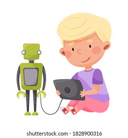 Cute Boy Sitting with Tablet PC and Configurating Robot Vector Illustration