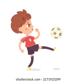 Cute boy soccer player playing with ball vector illustration. Cartoon isolated cheerful kid in sport uniform kicking ball with leg and running, athlete training in gym or outside to practice game