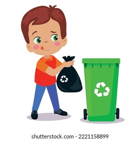 niño lindo tirando basura en la papelera de reciclaje