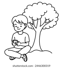 A Cute Boy Using Mobile Phone  Sitting Under  A  Tree