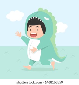 Cute boy  wearing dinosaur costume