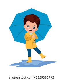 cute boy wearing a raincoat holding an umbrella