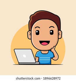 Cute boy working with laptop
