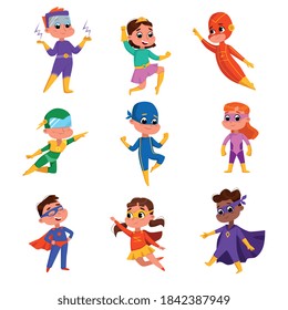 Cute Boys and Girls in Wearing Colorful Superhero Costumes and Masks Set, Adorable Kids Posing in Superhero Poses Cartoon Style Vector Illustration