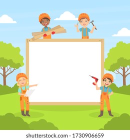 Cute Boys in Helmets with White Empty Banner, Smiling Little Builders Holding Professional Tools Vector Illustration