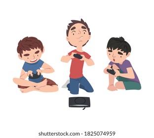 Cute Boys Sitting on Floor Playing Video Game, Children Having Fun Together with Computer Gaming Cartoon Style Vector Illustration