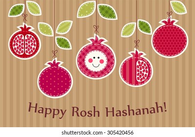 Cute bright pomegranates hanging on strings as Rosh Hashanah (Jewish New Year) symbols