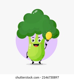 Cute broccoli character with light bulb idea