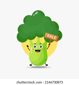 Cute broccoli character with sale sign
