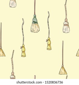 Cute broomstick doodles seamless pattern. Halloween decoration magic brooms background tile