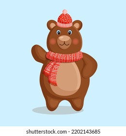 Cute brown bear in a winter hat and scarf. Vector illustration.
