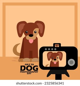 A cute brown dog posing during a photo shoot with a digital camera, with bold text on light brown background to celebrate National Dog Photography Day on July 26