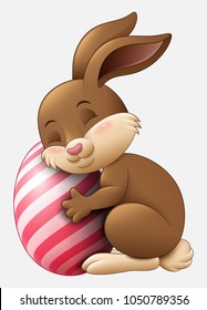 Cute brown Easter Bunny hugged egg decorated isolated on a white background