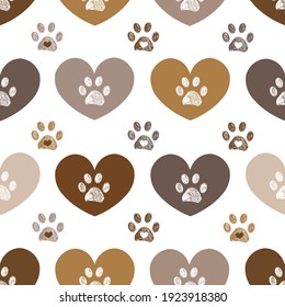 Cute brown hearts and doodle paw prints. Fabric design seamless pattern