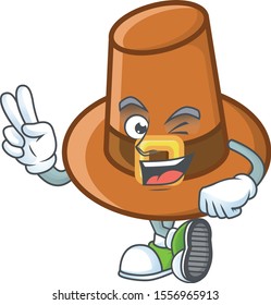 Cute brown pilgrim hat in two finger mascot.