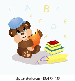 Cute brown Teddy bear wearing a baseball cap and holding a book. Cartoon character. Funny kids toy.