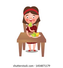 Cute brunette girl stay at kitchen table and eat fresh eco pears
