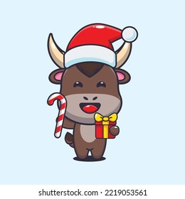 Cute bull holding christmas candy and gift. Cute christmas cartoon illustration. 