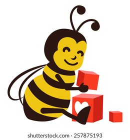 Cute bumblebee playing with toy blocks. EPS10