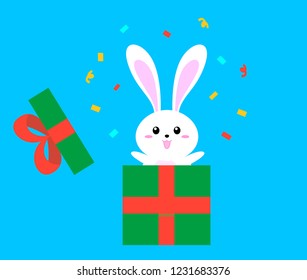 Cute bunny in a Christmas gift box