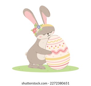 Cute bunny with flowers hugging a decorated Easter egg. Vector isolated cartoon illustration of a rabbit in a clearing.