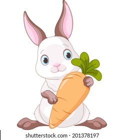 Cute bunny holding a large carrot.