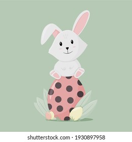 cute bunny on his Easter egg in pastel color