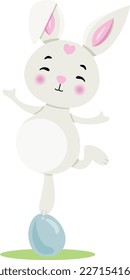 Cute bunny on top of easter egg
