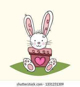 Cute bunny out from inside a colored vase