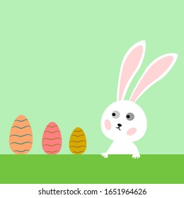Cute bunny rabbit cartoon looking at colorful of eggs on green background for easter day. Vector illustration cute animal style.