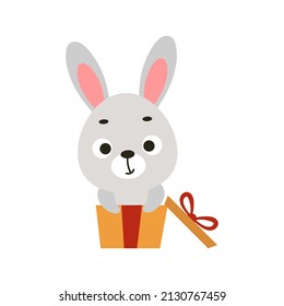 Cute bunny sit in gift box on white background. Cartoon animal character for kids cards, baby shower, invitation, poster, t-shirt composition, house interior. Vector stock illustration.