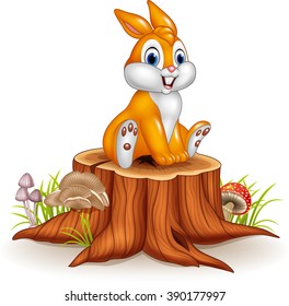 Cute bunny sitting on tree stump