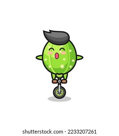The cute cactus character is riding a circus bike , cute style design for t shirt, sticker, logo element
