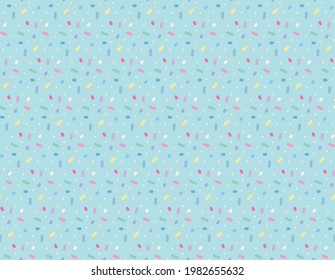Cute candy-like dots appear repeatedly on the sky blue background.