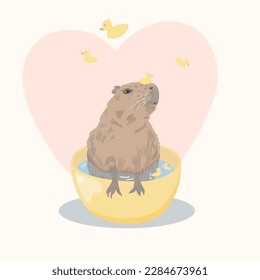 A cute capybara with beautiful eyes bathes in a yellow basin with ducks. Postcard