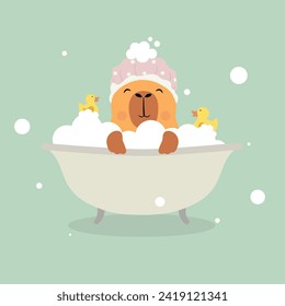 Cute Capybara with shower cap. Funny animal character takes a bath. Capybara swims with a yellow duck and bubbles