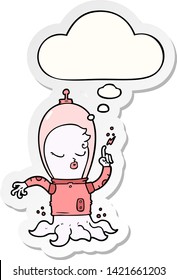 cute cartoon alien with thought bubble as a printed sticker