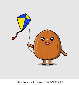 Cute cartoon Almond nut character playing kite flaying cartoon icon vector illustration