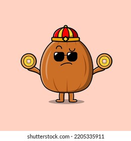 Cute cartoon almond nut chinese character holding coin in vector icon illustration