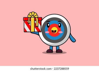 Cute cartoon Archery target character holding gift box in vector icon illustration