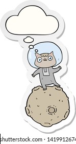 cute cartoon astronaut cat with thought bubble as a printed sticker