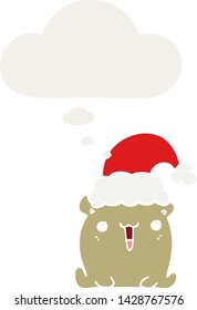lindo caricaturista con sombrero de navidad con burbuja de pensamiento en estilo retro