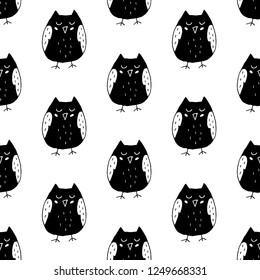 Cute cartoon bird background with hand drawn owls. Sweet vector black and white bird background. Seamless monochrome doodle bird background for textile, wallpapers, wrapping paper and cards.