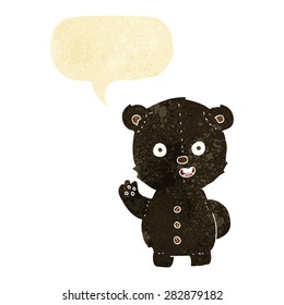 cute cartoon black bear with speech bubble