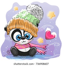 Cute Cartoon black Kitten in a knitted cap sits on a snow