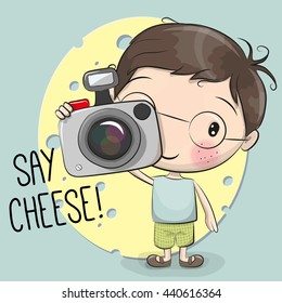 Cute cartoon Boy with a camera on a blue background