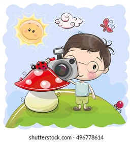 Cute cartoon Boy with a camera on the meadow