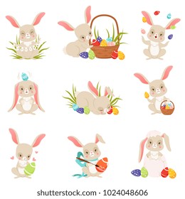 Cute cartoon bunnies holding and eggs set, funny rabbit characters, Happy Easter concept cartoon vector Illustrations