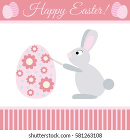 Cute cartoon bunny paints egg. Card to Easter