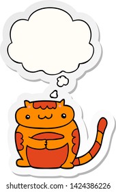 cute cartoon cat with thought bubble as a printed sticker